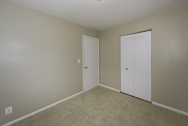 241 Dakota Ave, Ypsilanti, MI 48198 - unfurnished bedroom with carpet flooring and a closet