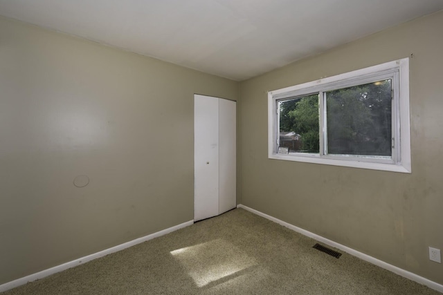 241 Dakota Ave, Ypsilanti, MI 48198 - unfurnished bedroom with carpet floors and a closet