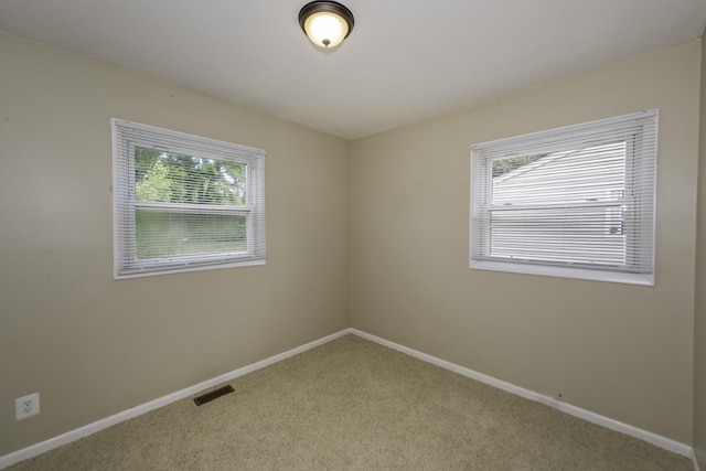 241 Dakota Ave, Ypsilanti, MI 48198 - spare room with carpet flooring and baseboards
