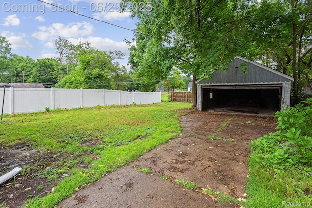 16746 Bramell St, Detroit, MI 48219 - view of yard featuring a garage and an outdoor structure