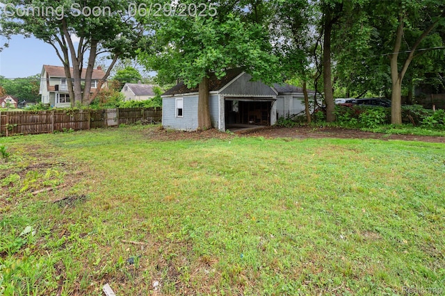 16746 Bramell St, Detroit, MI 48219 - view of yard with an outbuilding and a detached garage