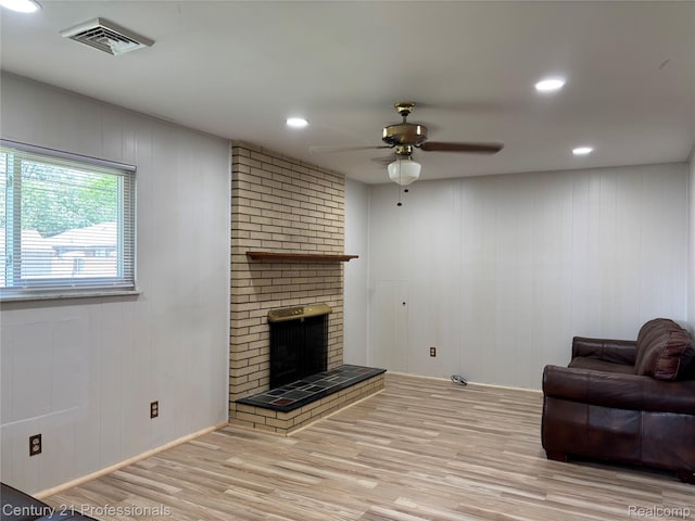 8105 Busch, Center Line, MI 48015 - living room with wood finished floors, a fireplace, ceiling fan, and recessed lighting