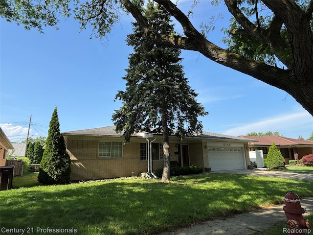 8105 Busch, Center Line, MI 48015 - ranch-style house with a garage, brick siding, and driveway