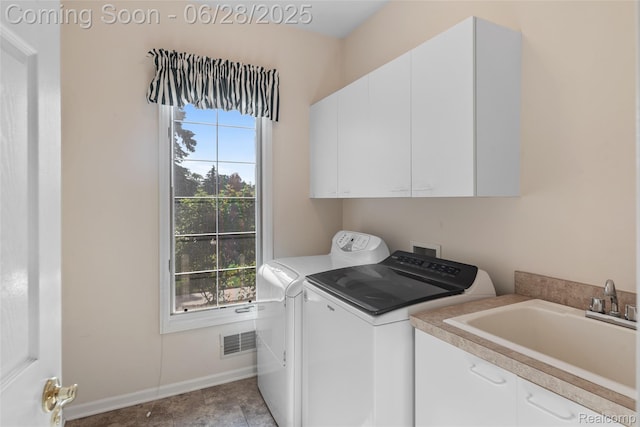 17601 Rolling Woods Cir, Northville, MI 48168 - laundry room featuring cabinet space and washing machine and dryer