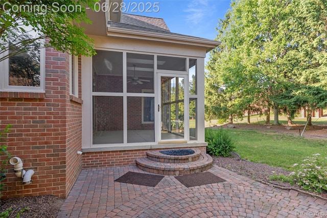 17601 Rolling Woods Cir, Northville, MI 48168 - entrance to property featuring brick siding, a patio area, a lawn, and a shingled roof
