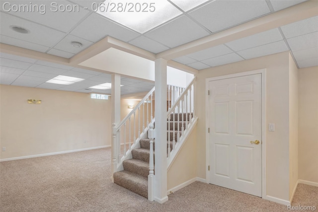 17601 Rolling Woods Cir, Northville, MI 48168 - stairway featuring a paneled ceiling and carpet