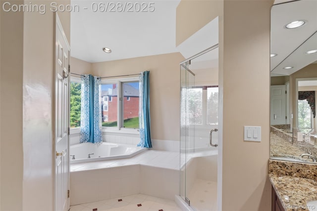 17601 Rolling Woods Cir, Northville, MI 48168 - bathroom featuring vanity, a stall shower, a jetted tub, tile patterned floors, and recessed lighting