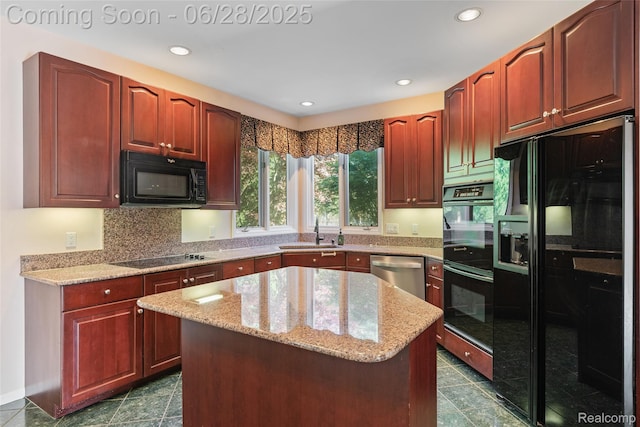 17601 Rolling Woods Cir, Northville, MI 48168 - kitchen featuring black appliances, light stone countertops, a center island, recessed lighting, and decorative backsplash