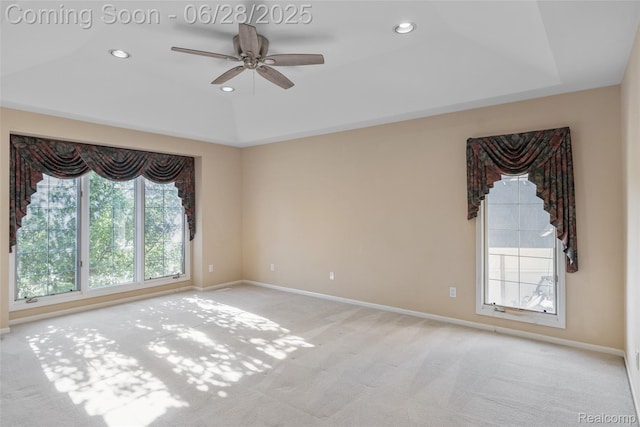 17601 Rolling Woods Cir, Northville, MI 48168 - empty room featuring ceiling fan, light colored carpet, a tray ceiling, and recessed lighting