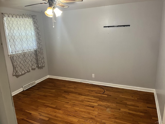 4704 Bishop St, Millington, MI 48746 - unfurnished room featuring dark wood-style floors and ceiling fan