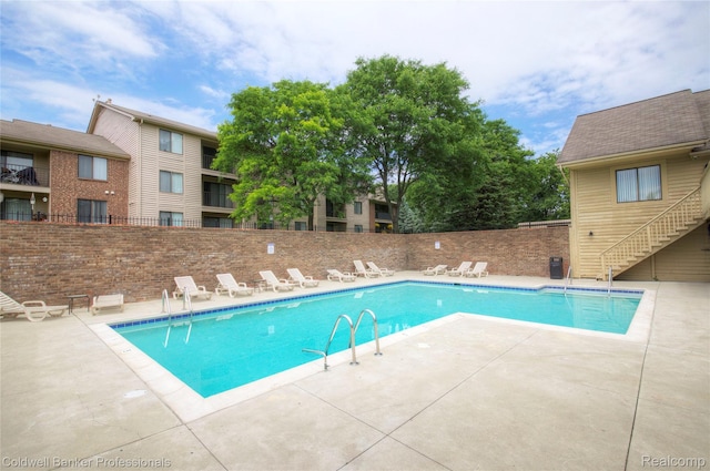 2635 Greenstone Blvd Unit 508, Auburn Hills, MI 48326 - community pool with a patio and stairway