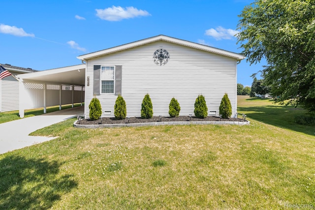 13541 Austin Ct, Hartland, MI 48353 - view of home's exterior featuring an attached carport, a lawn, and driveway