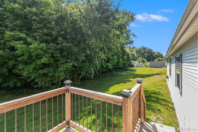 13541 Austin Ct, Hartland, MI 48353 - deck featuring a yard