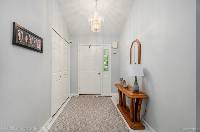 3675 S Commerce Rd, Commerce Twp, MI 48390 - entryway with a chandelier and baseboards