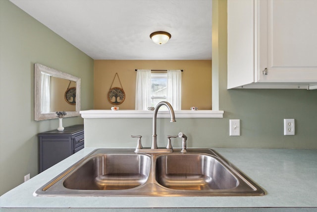 12350 S Butternut Ave, Sand Lake, MI 49343 - kitchen view of white cabinetry and light countertops