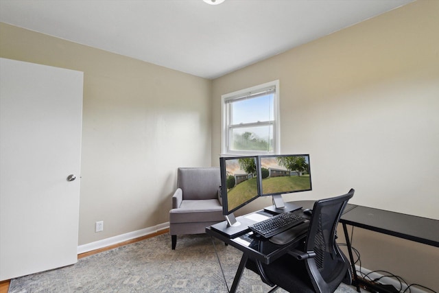 12350 S Butternut Ave, Sand Lake, MI 49343 - sitting room with an office area and wood finished floors