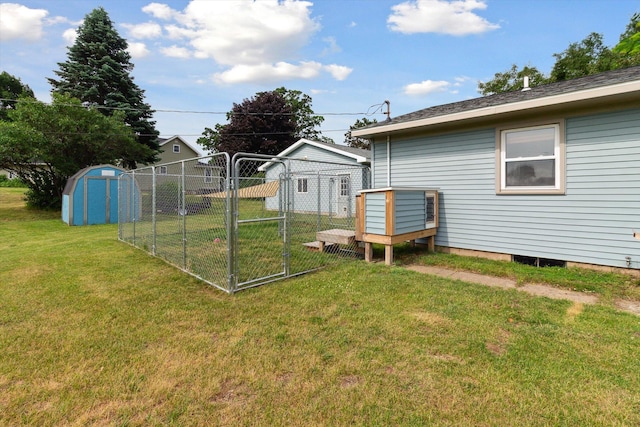 12350 S Butternut Ave, Sand Lake, MI 49343 - view of yard with a storage unit