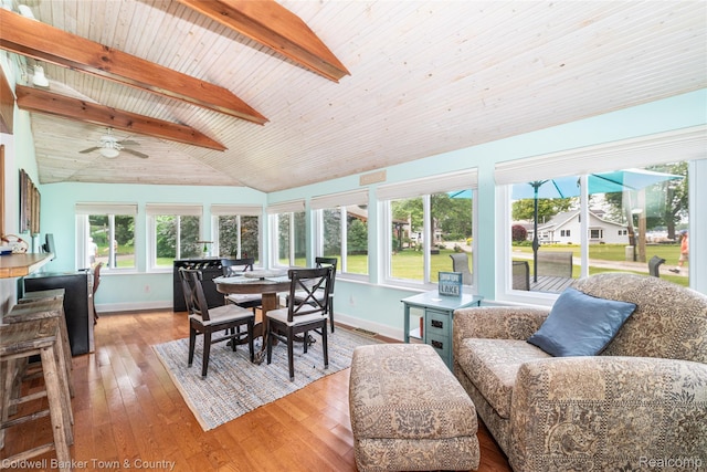 11729 Algonquin Dr, Pinckney, MI 48169 - sunroom / solarium with outdoor dining space, ceiling fan, and wood-type flooring