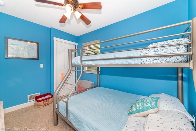 11729 Algonquin Dr, Pinckney, MI 48169 - carpeted bedroom with baseboards and ceiling fan