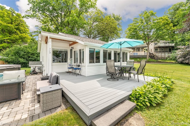11729 Algonquin Dr, Pinckney, MI 48169 - deck with outdoor dining area, a lawn, and an outdoor hangout area