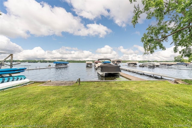 11729 Algonquin Dr, Pinckney, MI 48169 - dock featuring a lawn and a water view