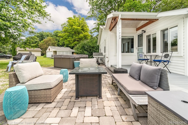 11729 Algonquin Dr, Pinckney, MI 48169 - view of patio with a hot tub and outdoor lounge area