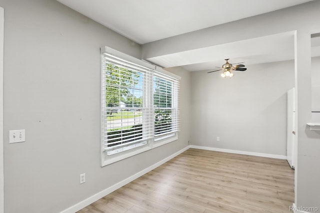 3043 Oakridge Ct, Lake Orion, MI 48360 - empty room featuring light wood finished floors and a ceiling fan