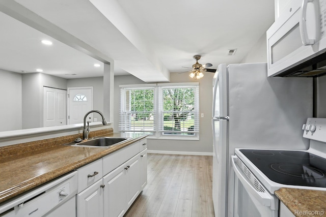 3043 Oakridge Ct, Lake Orion, MI 48360 - kitchen featuring white appliances, white cabinets, light wood-style flooring, recessed lighting, and a ceiling fan