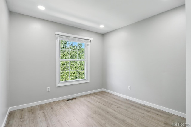3043 Oakridge Ct, Lake Orion, MI 48360 - empty room with light wood-style floors and recessed lighting
