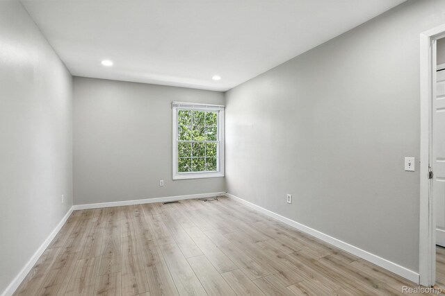 3043 Oakridge Ct, Lake Orion, MI 48360 - empty room with light wood-style floors and recessed lighting