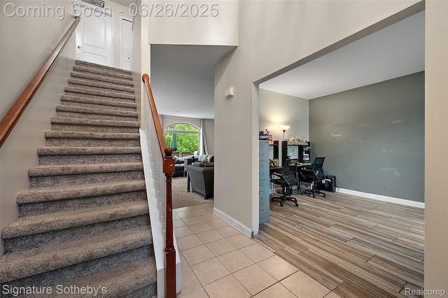 2155 Canal St, Commerce Twp, MI 48382 - stairs with wood finish floors and baseboards