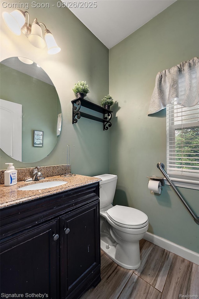 2155 Canal St, Commerce Twp, MI 48382 - bathroom featuring wood finished floors and vanity