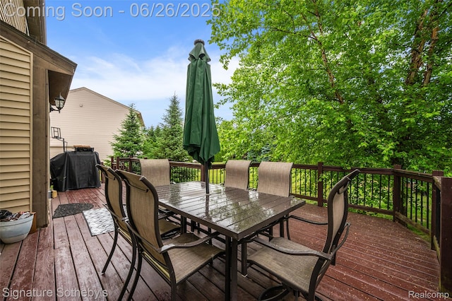 2155 Canal St, Commerce Twp, MI 48382 - wooden terrace featuring outdoor dining space and area for grilling