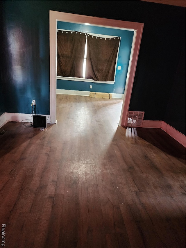 7458 E Quinn St, Detroit, MI 48234 - empty room featuring wood-type flooring and baseboards