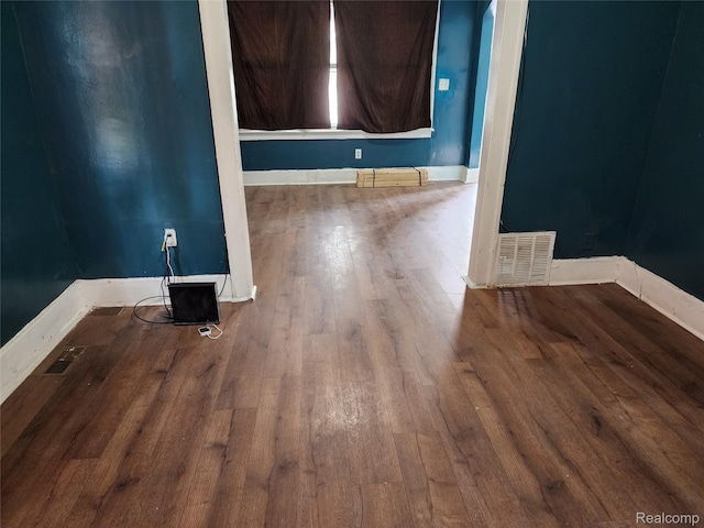 7458 E Quinn St, Detroit, MI 48234 - spare room featuring hardwood / wood-style floors