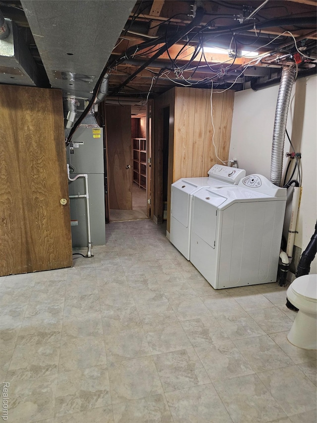 3976 Bristol Dr, Troy, MI 48083 - unfinished below grade area featuring washing machine and clothes dryer and heating unit