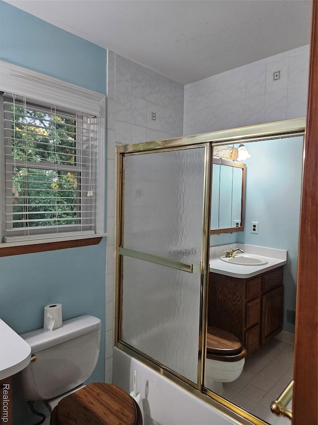 3976 Bristol Dr, Troy, MI 48083 - full bath with vanity, combined bath / shower with glass door, and tile patterned floors