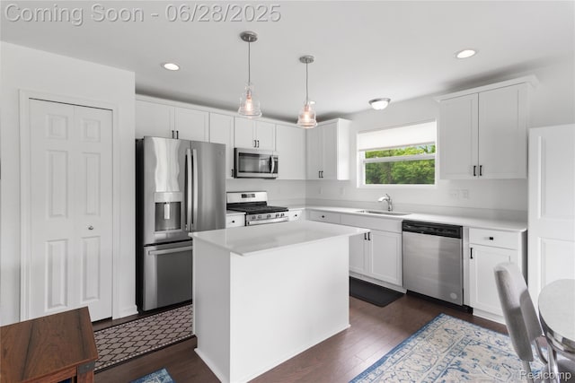 10001 Swan Lake Cir, Ypsilanti, MI 48197 - kitchen featuring stainless steel appliances, white cabinets, light countertops, dark wood-style floors, and recessed lighting