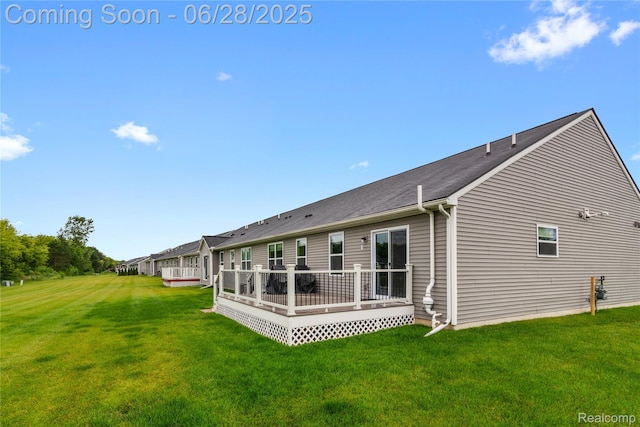 10001 Swan Lake Cir, Ypsilanti, MI 48197 - back of house featuring a yard and a deck
