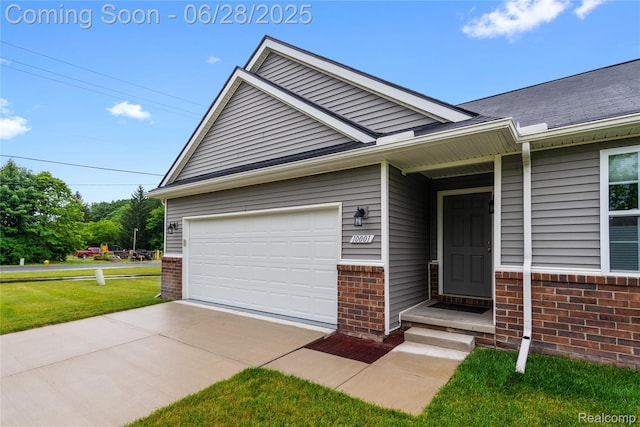 10001 Swan Lake Cir, Ypsilanti, MI 48197 - view of front facade with brick siding, driveway, and a front lawn