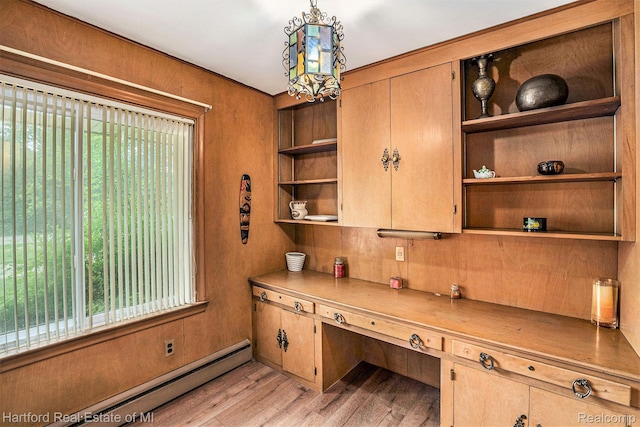 19100 Coral Gables St, Southfield, MI 48076 - unfurnished office featuring a baseboard radiator and light wood-style floors
