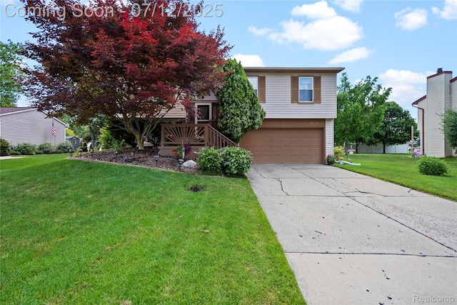 23528 Londonderry, Novi, MI 48375 - view of front of house with an attached garage, concrete driveway, and a front yard