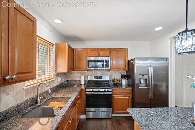 23528 Londonderry, Novi, MI 48375 - kitchen with appliances with stainless steel finishes, brown cabinetry, dark stone countertops, decorative backsplash, and dark wood finished floors