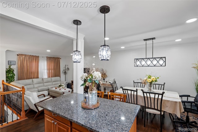 23528 Londonderry, Novi, MI 48375 - kitchen with dark wood-style flooring, recessed lighting, stone countertops, brown cabinetry, and decorative light fixtures