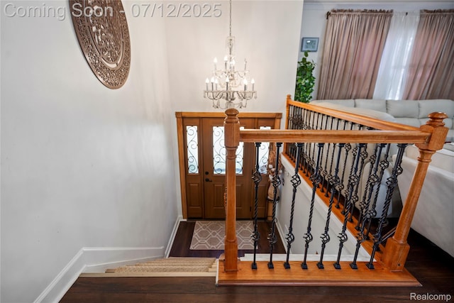 23528 Londonderry, Novi, MI 48375 - entryway featuring a chandelier and wood finished floors