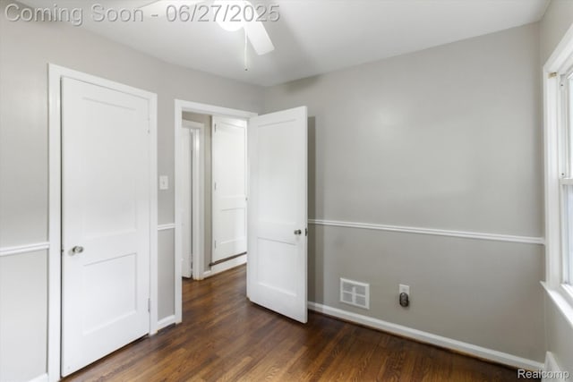 15848 Woodworth, Plymouth, MI 48239 - unfurnished bedroom featuring dark wood-type flooring and baseboards