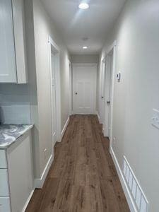 817 Sandow Rd, Midland, MI 48640 - corridor featuring wood finished floors