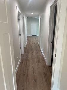 817 Sandow Rd, Midland, MI 48640 - corridor featuring dark wood finished floors and recessed lighting