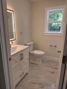 817 Sandow Rd, Midland, MI 48640 - bathroom featuring toilet and vanity