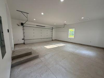 817 Sandow Rd, Midland, MI 48640 - garage featuring recessed lighting